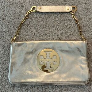 Tory Burch gold clutch with removable shoulder chain